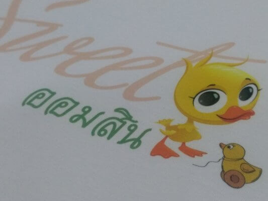 สกรีนดิจิตอล DTG บนเสื้อขาว